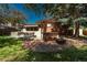 Charming backyard with a built-in grill, bar seating, and patio, perfect for entertaining and outdoor gatherings at 5000 S Chester St, Greenwood Village, CO 80111