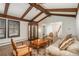 Bright living room with hardwood floors, vaulted ceilings, and ample natural light at 5000 S Chester St, Greenwood Village, CO 80111