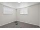 Versatile bedroom space with grey carpet and neutral walls at 9647 Pelon Dr, Northglenn, CO 80260