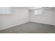 Empty bedroom with grey carpet, ready for personalization at 9647 Pelon Dr, Northglenn, CO 80260