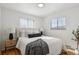 Well-lit bedroom with plush bed and stylish nightstands at 9647 Pelon Dr, Northglenn, CO 80260