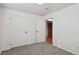 Simple bedroom with roomy closet and neutral decor at 9647 Pelon Dr, Northglenn, CO 80260