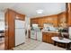 Updated kitchen with ample storage and a breakfast nook at 9647 Pelon Dr, Northglenn, CO 80260