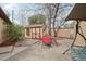 This backyard has a cozy sitting area, storage shed, and rock landscaping for low maintenance at 55 Emerald St, Broomfield, CO 80020