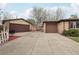 Long driveway leading to the detached garage and the main house, offering ample parking space at 55 Emerald St, Broomfield, CO 80020