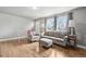 Bright living room with hardwood floors, comfortable seating and plenty of natural light at 55 Emerald St, Broomfield, CO 80020