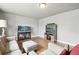 Bright living room featuring hardwood floors and modern furniture at 55 Emerald St, Broomfield, CO 80020
