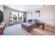Bedroom with natural light and comfortable seating area at 12035 Fontberry St, Parker, CO 80134