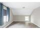 Neutral bedroom with two windows and wood floors at 2565 Pierce St, Lakewood, CO 80214