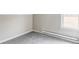 Neutral bedroom features gray carpet, natural light from the window, and fresh paint at 2565 Pierce St, Lakewood, CO 80214