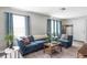 Inviting living room featuring stylish furniture and a bright, airy feel at 2565 Pierce St, Lakewood, CO 80214
