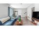 Spacious living room with comfortable seating and modern accents at 2565 Pierce St, Lakewood, CO 80214