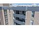 Exterior view showing the condo's stacked balconies at 601 W 11Th Ave # 1109, Denver, CO 80204