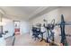 A spacious bedroom with a neutral color palette is equipped with a desk, office chair, and computer at 601 W 11Th Ave # 1109, Denver, CO 80204