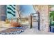 Access the community amenities through this entrance in a building with brick accents at 601 W 11Th Ave # 1109, Denver, CO 80204