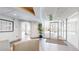Hall with wood floors, seating and entrance to mail room at 601 W 11Th Ave # 1109, Denver, CO 80204
