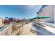 Entertain on this rooftop deck with picnic tables, lounge furniture, and city views at 601 W 11Th Ave # 1109, Denver, CO 80204