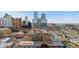 A wide aerial view of an urban neighborhood with buildings of various heights and architecture at 1499 Blake St # 3O, Denver, CO 80202