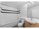 Clean bathroom with white tile and a shower-tub combination at 1499 Blake St # 3O, Denver, CO 80202