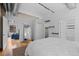 The main bedroom features wood floors and ensuite bathroom at 1499 Blake St # 3O, Denver, CO 80202