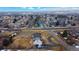 Overhead view of home with mature trees and spacious backyard at 7208 Secrest Ct, Arvada, CO 80007