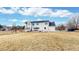 Expansive backyard with patio, grill, and plenty of space for entertaining at 7208 Secrest Ct, Arvada, CO 80007