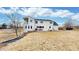 Lovely exterior elevation with a spacious backyard at 7208 Secrest Ct, Arvada, CO 80007