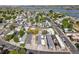 Aerial view showcases the neighborhood layout with lake views and community amenities nearby at 8426 Cook Way, Denver, CO 80229