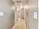 Hallway featuring neutral walls and wood flooring at 8426 Cook Way, Denver, CO 80229