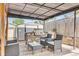 Backyard patio featuring a grill, outdoor seating, a pergola and a storage shed at 8426 Cook Way, Denver, CO 80229