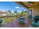 Outdoor deck with seating and a ceiling fan, perfect for relaxation and outdoor dining at 6711 S Catawba Way, Aurora, CO 80016