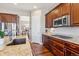Close-up of a gourmet kitchen featuring stainless steel appliances, granite countertops, and ample cabinetry at 6711 S Catawba Way, Aurora, CO 80016