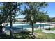 Well-maintained community tennis courts surrounded by mature trees and lush greenery at 6711 S Catawba Way, Aurora, CO 80016