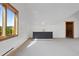 Bonus room featuring light walls, a wet bar, and a large window at 280 Hess Ave, Golden, CO 80401