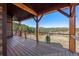Expansive wooden deck with cable railings, offering stunning views of the surrounding landscape at 280 Hess Ave, Golden, CO 80401