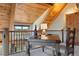 Inviting home office area with natural wood accents, rustic desk, and picturesque mountain views at 280 Hess Ave, Golden, CO 80401