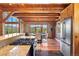 Open-concept kitchen with granite countertops, stainless steel appliances, and access to a dining area at 280 Hess Ave, Golden, CO 80401