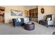 Cozy living room with plush seating, decorative accents, and a built-in wooden cabinet at 280 Hess Ave, Golden, CO 80401