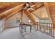 Cozy loft space with exposed beams, desk area, natural light and view of the surrounding landscape at 280 Hess Ave, Golden, CO 80401