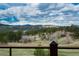 Breathtaking mountain view from the house, overlooking a lush green valley at 280 Hess Ave, Golden, CO 80401