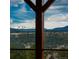 Scenic view from the property, showcasing lush greenery and snow-capped mountains in the distance at 280 Hess Ave, Golden, CO 80401