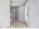 Bright foyer with tile flooring and a staircase, showcasing neutral wall tones at 93 S Nome St, Aurora, CO 80012