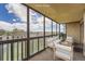 Relaxing enclosed balcony with stunning views, comfortable furniture and ample sunlight at 14152 E Linvale Pl # 509, Aurora, CO 80014