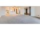 Spacious living room with access to the kitchen area, providing an open and airy feel at 14152 E Linvale Pl # 509, Aurora, CO 80014