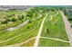 Aerial view of scenic walking path following a river in a park at 3212 Fulton St, Denver, CO 80238