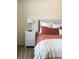This cozy bedroom is accented by neutral decor and plush carpeting at 3567 E 140Th Dr, Thornton, CO 80602