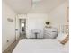 Well-lit bedroom features neutral walls, modern decor, and plush carpet at 3567 E 140Th Dr, Thornton, CO 80602