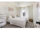 Well-lit bedroom with plush carpeting, modern decor, and a bright window at 3567 E 140Th Dr, Thornton, CO 80602