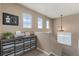 Landing with a storage cabinet and natural light at 10245 Nottingham Dr, Parker, CO 80134
