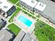 Beautiful aerial view of a community pool surrounded by green spaces and apartments at 1517 S Owens St # 5, Denver, CO 80232